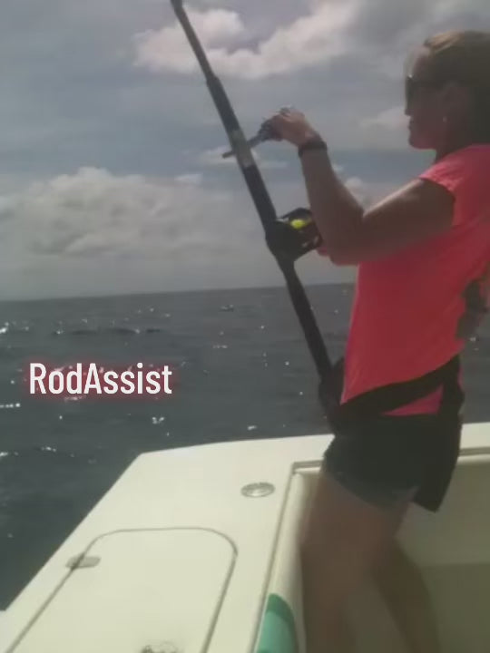 woman using the rod assistant while deep sea fishing